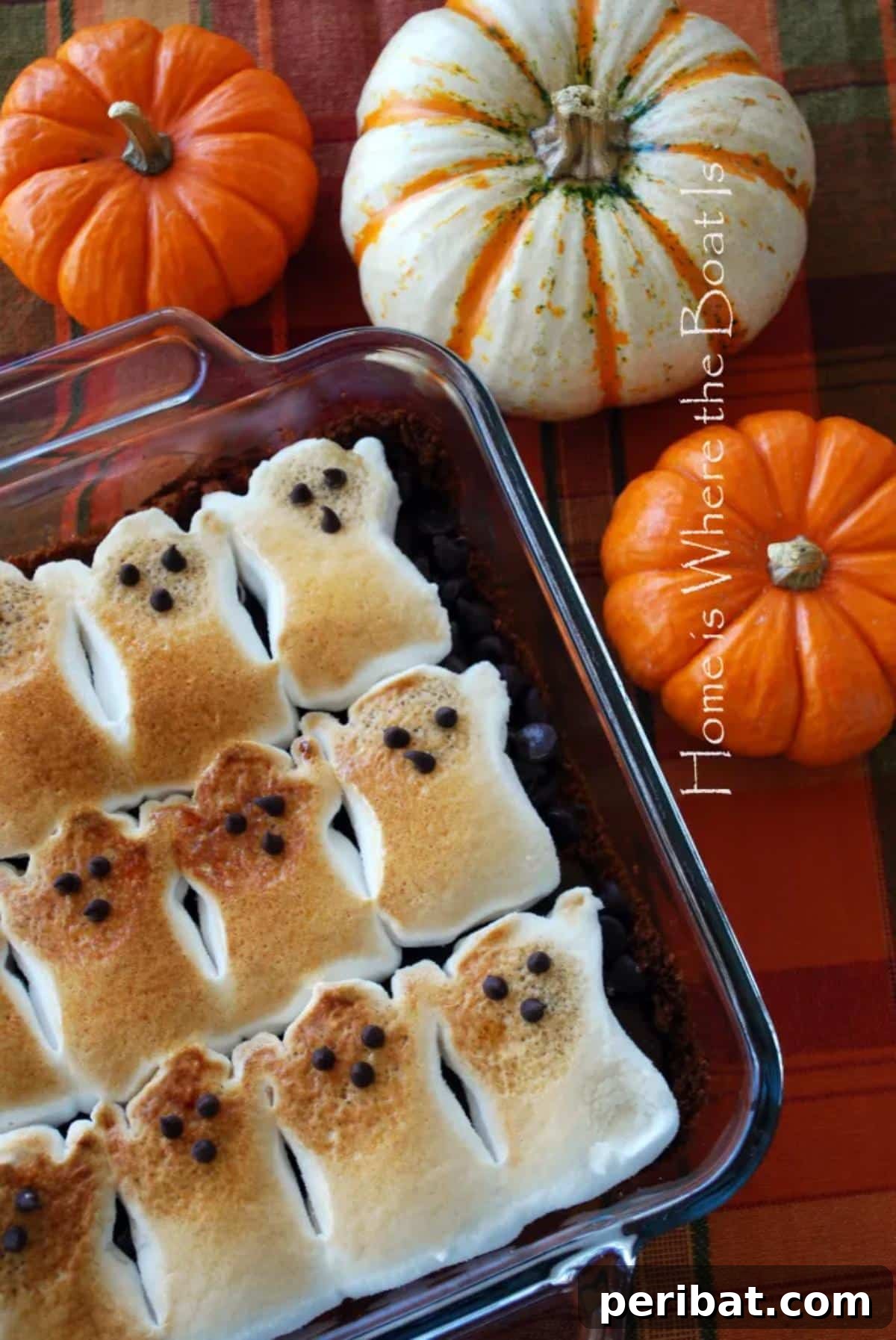 40 Spooktacularly Simple DIY Halloween Decorations 14 DIY Ghostly Peep Centerpiece made with marshmallows and brownies