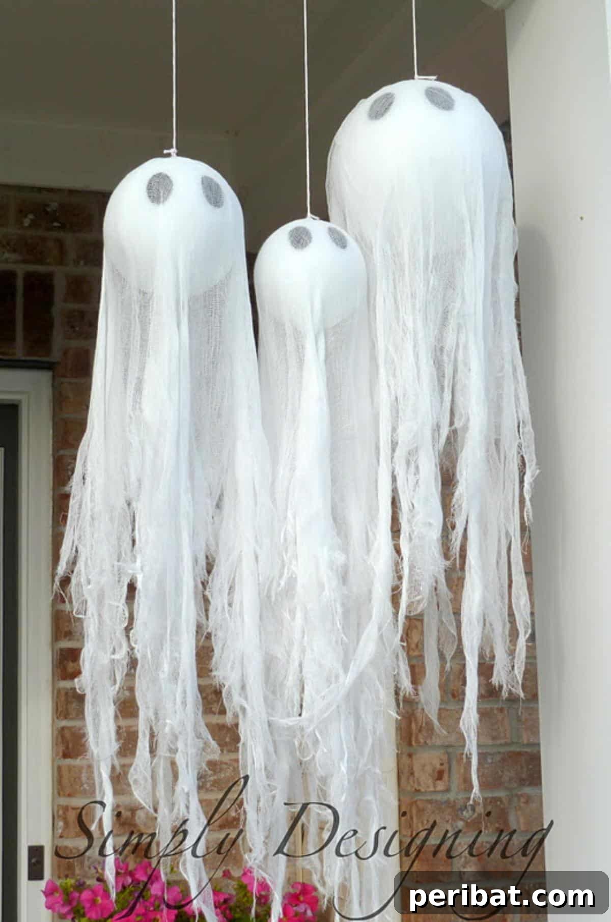 40 Spooktacularly Simple DIY Halloween Decorations 15 DIY Hanging Ghosts halloween decoration with cheesecloth