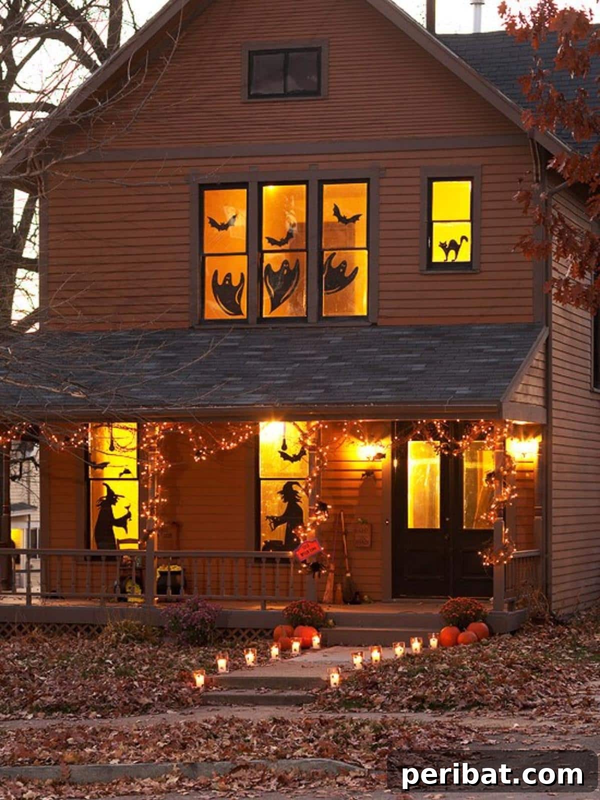40 Spooktacularly Simple DIY Halloween Decorations 26 DIY Window Silhouettes for Halloween featuring a witch and cat