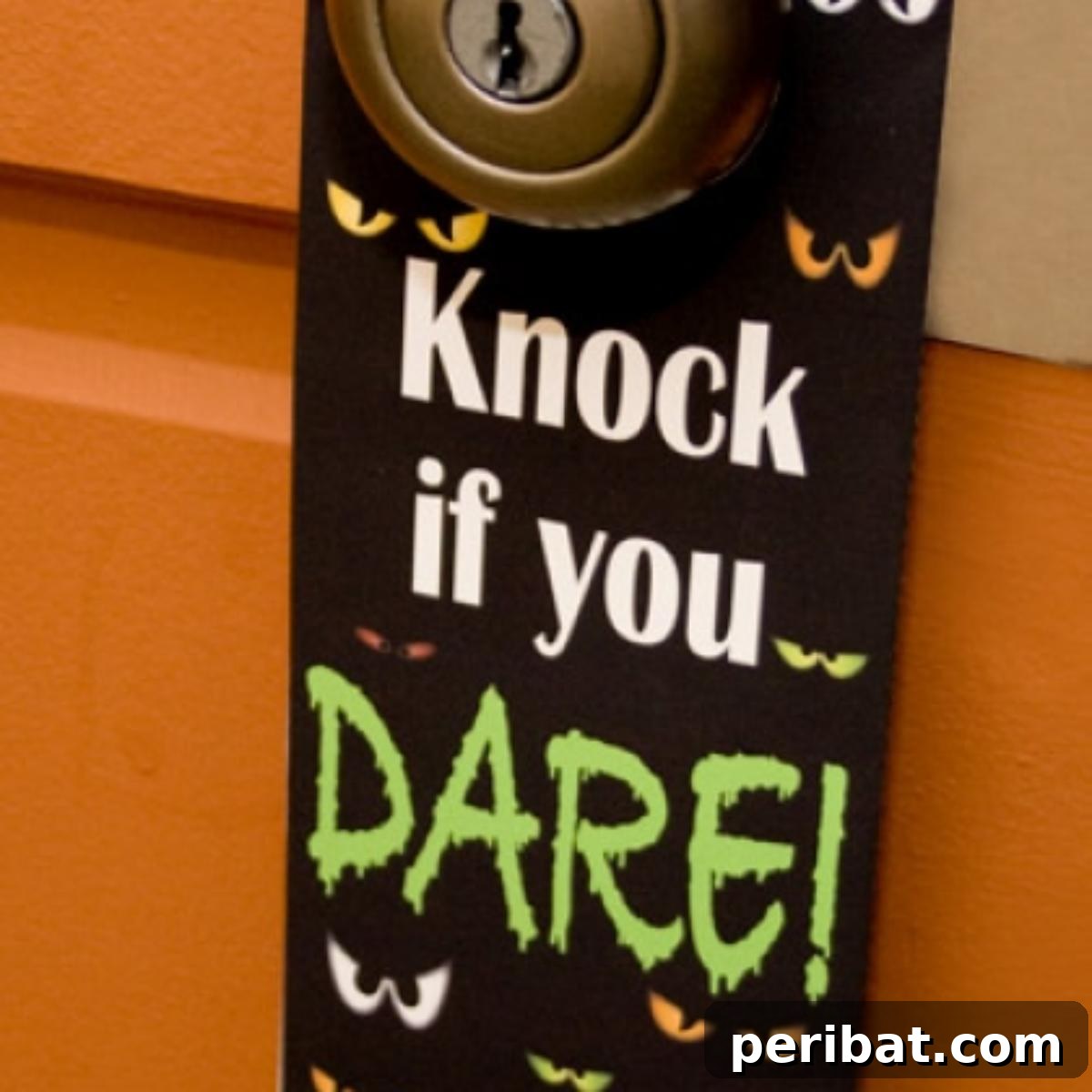 40 Spooktacularly Simple DIY Halloween Decorations 29 DIY Halloween Door Hanger with a spooky ghost design