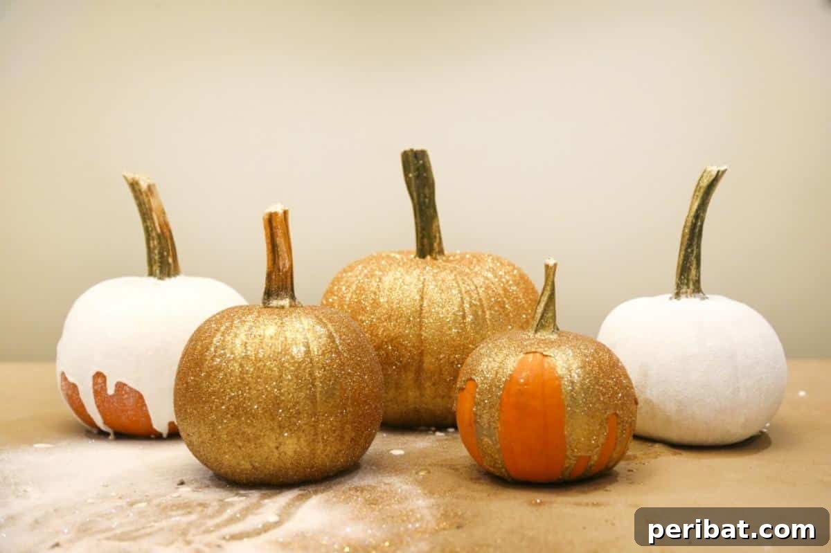 40 Spooktacularly Simple DIY Halloween Decorations 38 DIY Glittery Pumpkins in various sizes for a centerpiece