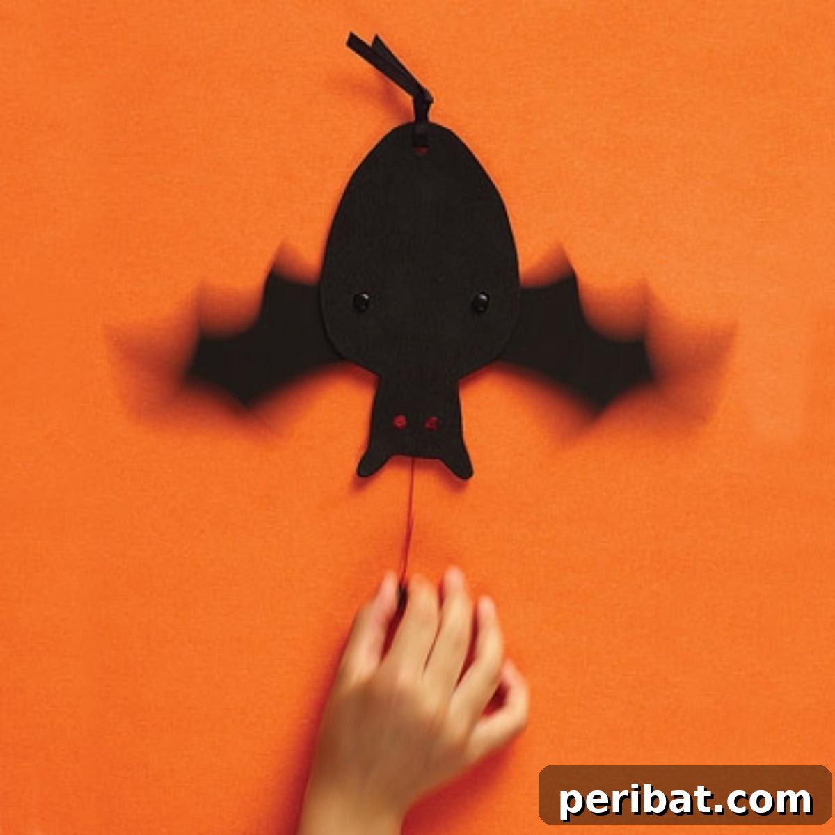 40 Spooktacularly Simple DIY Halloween Decorations 49 DIY Flapping Bat Halloween decoration for an interactive display
