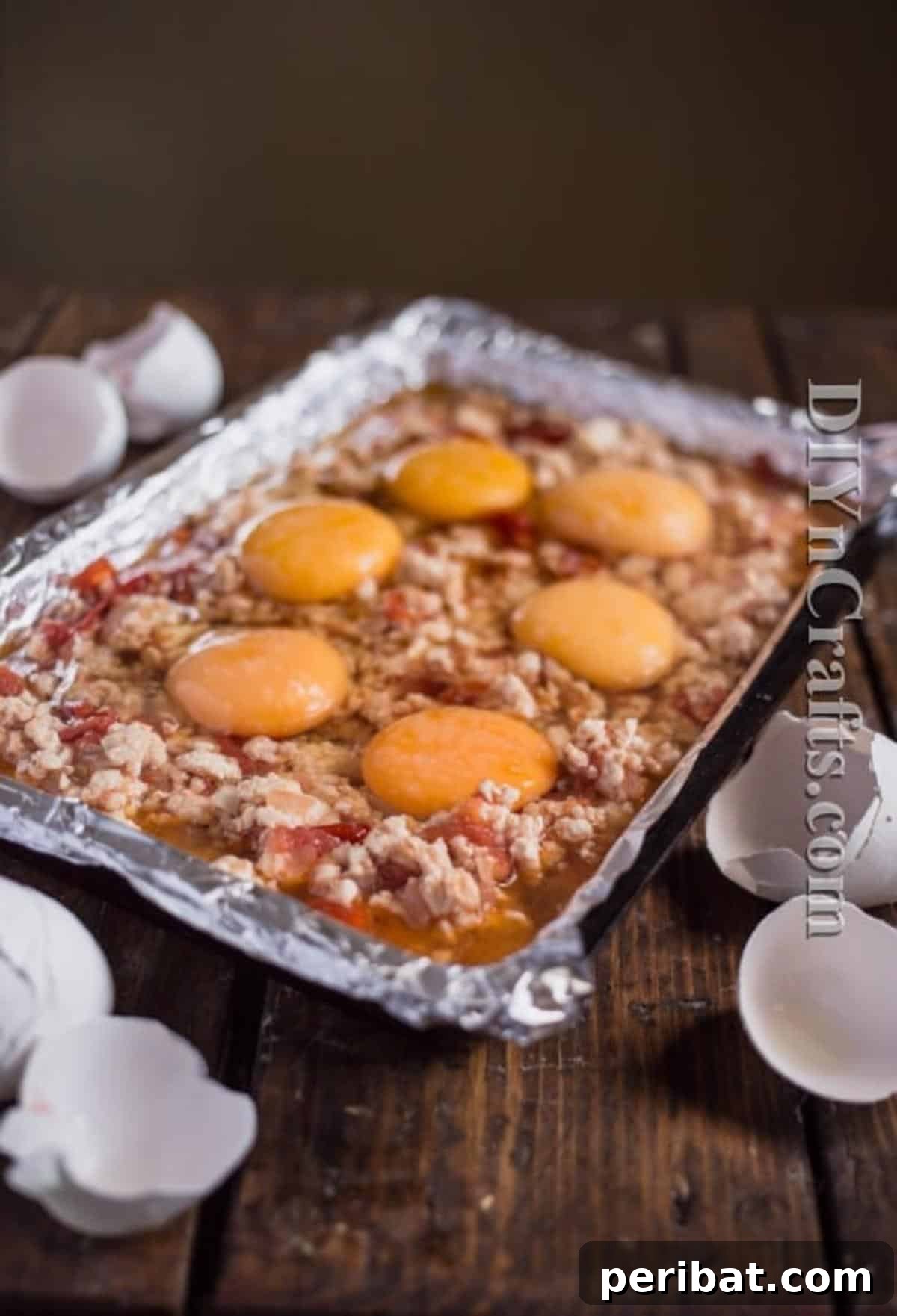 One Pan Turkey Egg Leftover Brunch 5 All ingredients mixed with topped eggs in a baking dish, ready to be put into the oven.