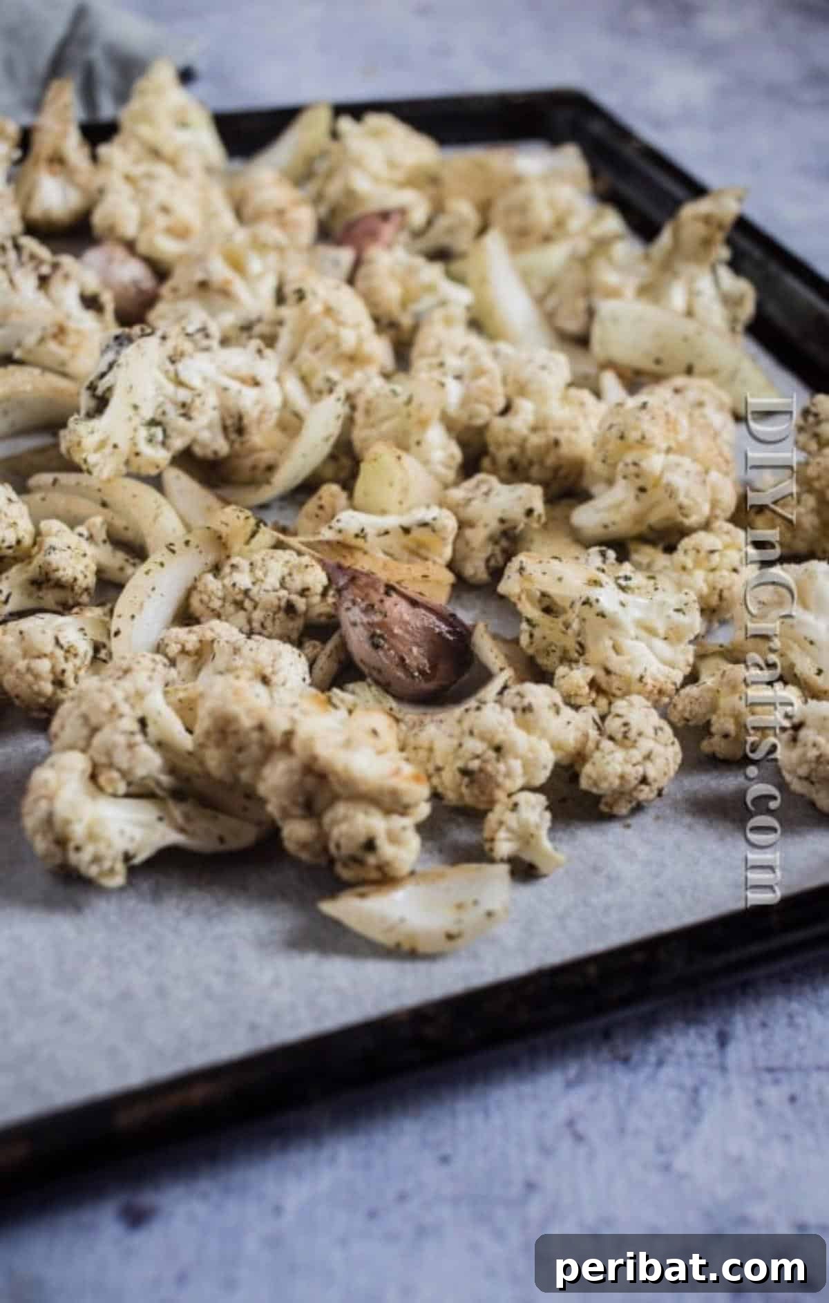 Easy and Healthy Roasted Cauliflower Side Dish 4 Chop cauliflower and mix with onion, garlic and olive oil