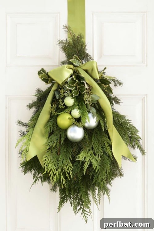 Nature's Touch: Fresh Evergreen Decor for a Festive Christmas 5 Fresh Evergreen Holiday Door Swag