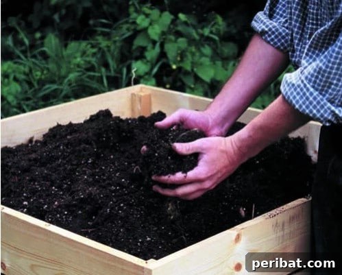 Easy Weekend Compost Bins You Can Build on a Budget 27 Multi-layered, stackable compost bin designed for easy turning and management.