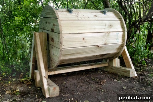 Easy Weekend Compost Bins You Can Build on a Budget 32 Rotating wood barrel compost bin, built from 2x4s and nails, for easy mixing.