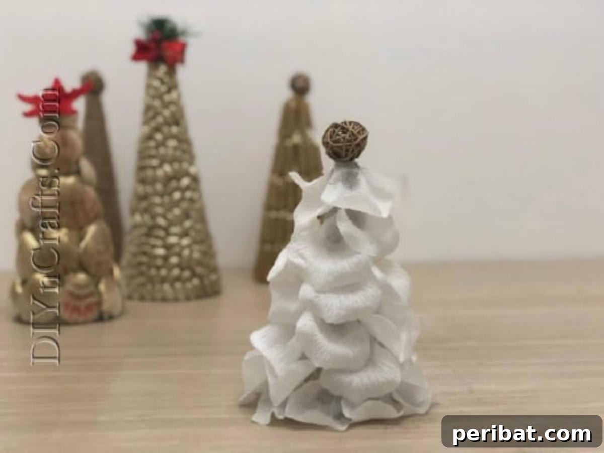 A beautifully completed flower petal Christmas tree, showcasing its dainty and ethereal aesthetic.