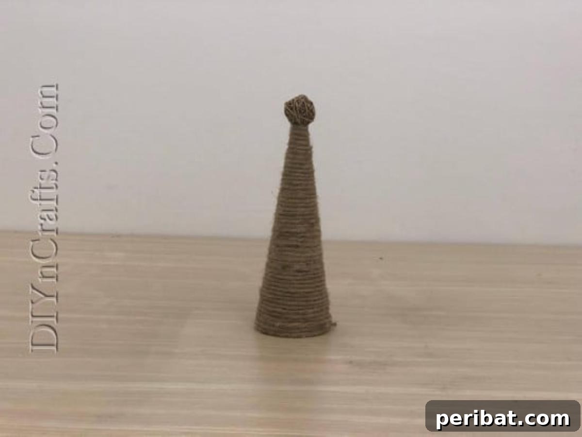 A stunning, embellished twine Christmas tree displayed as unique holiday decor.