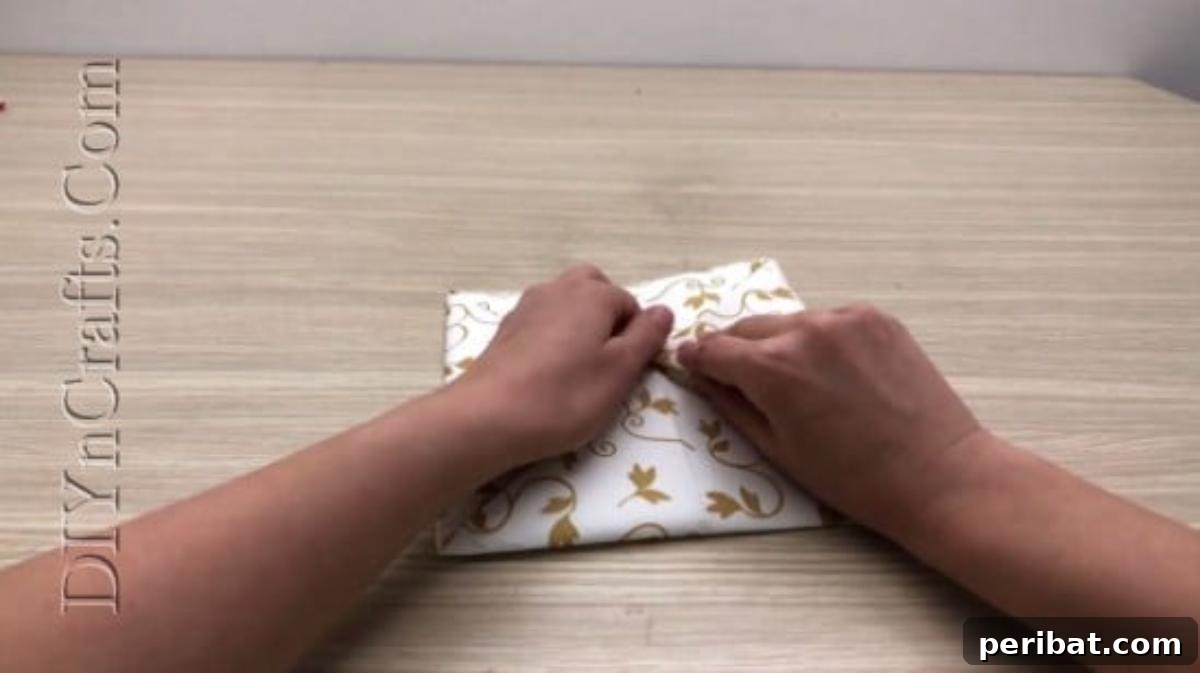 Festive Folds: 5 Simple Christmas Napkin Designs 14 Ornamental Flower - How to Fold These 5 Easy and Decorative Christmas Napkins