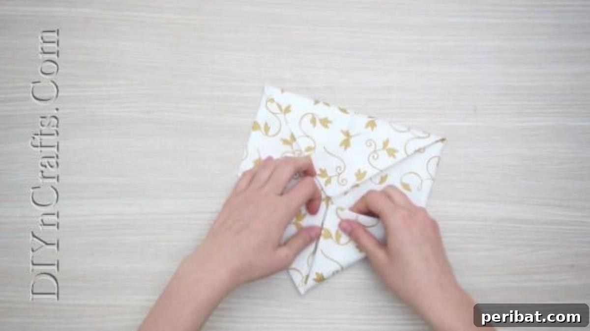 Festive Folds: 5 Simple Christmas Napkin Designs 15 Ornamental Flower - How to Fold These 5 Easy and Decorative Christmas Napkins