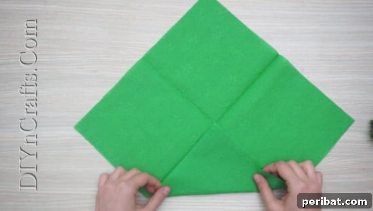 Festive Folds: 5 Simple Christmas Napkin Designs 21 Christmas Cheer - How to Fold These 5 Easy and Decorative Christmas Napkins