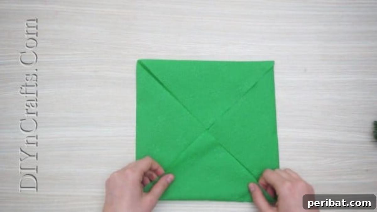 Festive Folds: 5 Simple Christmas Napkin Designs 22 Christmas Cheer - How to Fold These 5 Easy and Decorative Christmas Napkins