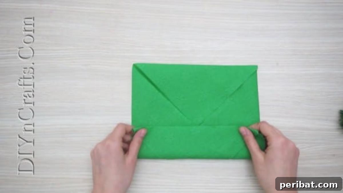 Festive Folds: 5 Simple Christmas Napkin Designs 23 Christmas Cheer - How to Fold These 5 Easy and Decorative Christmas Napkins