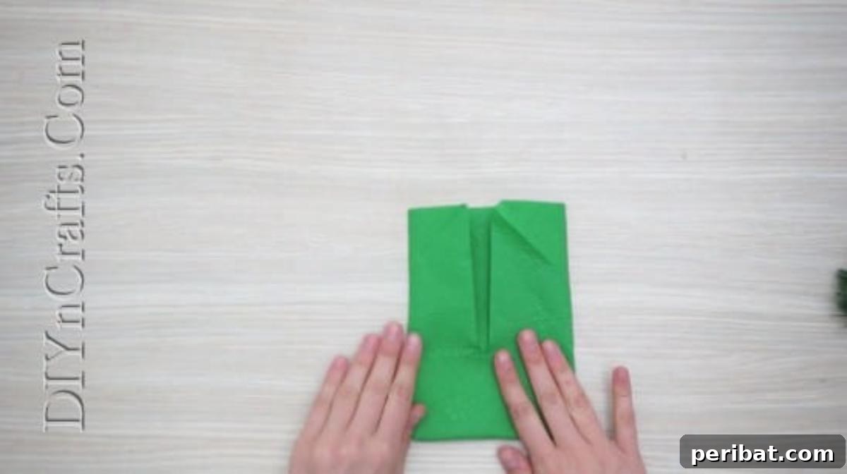 Festive Folds: 5 Simple Christmas Napkin Designs 25 Christmas Cheer - How to Fold These 5 Easy and Decorative Christmas Napkins