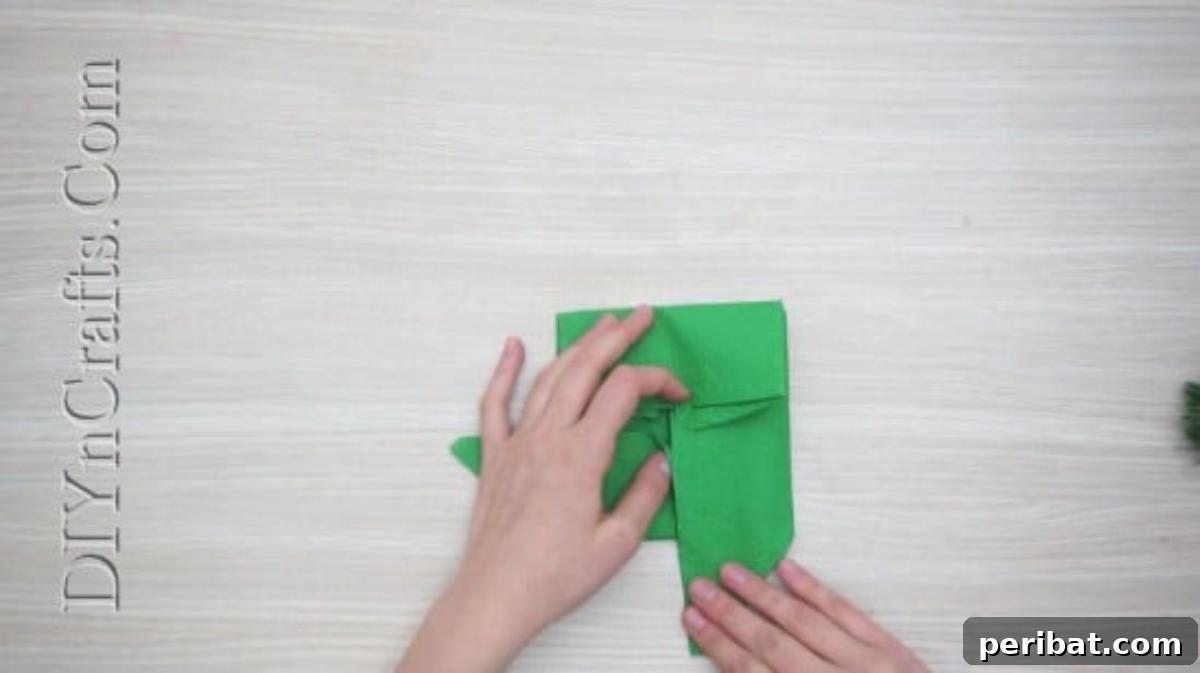 Festive Folds: 5 Simple Christmas Napkin Designs 28 Christmas Cheer - How to Fold These 5 Easy and Decorative Christmas Napkins
