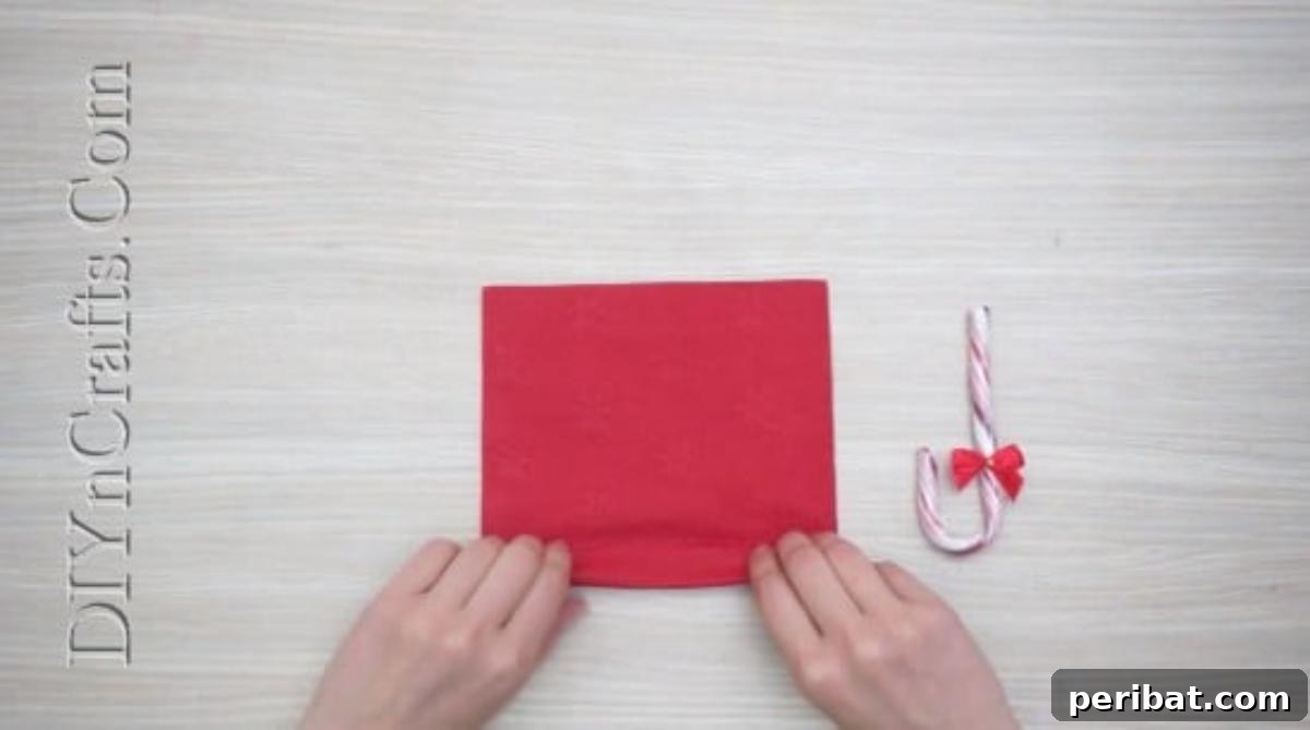 Festive Folds: 5 Simple Christmas Napkin Designs 31 Candy Cane Umbrella - How to Fold These 5 Easy and Decorative Christmas Napkins