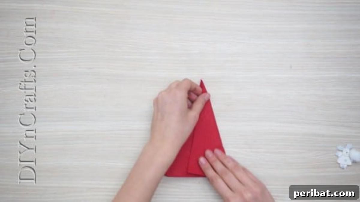 Festive Folds: 5 Simple Christmas Napkin Designs 39 Santa Hat - How to Fold These 5 Easy and Decorative Christmas Napkins
