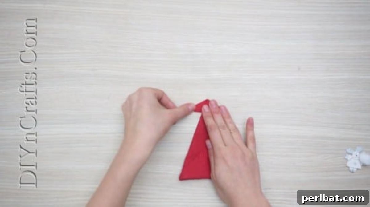 Festive Folds: 5 Simple Christmas Napkin Designs 40 Santa Hat - How to Fold These 5 Easy and Decorative Christmas Napkins