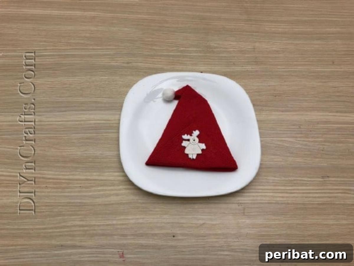 Festive Folds: 5 Simple Christmas Napkin Designs 43 Santa Hat - How to Fold These 5 Easy and Decorative Christmas Napkins