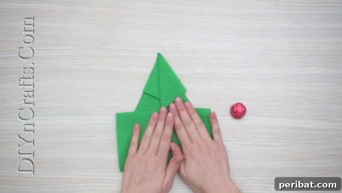 Festive Folds: 5 Simple Christmas Napkin Designs 7 Christmas Tree - How to Fold These 5 Easy and Decorative Christmas Napkins