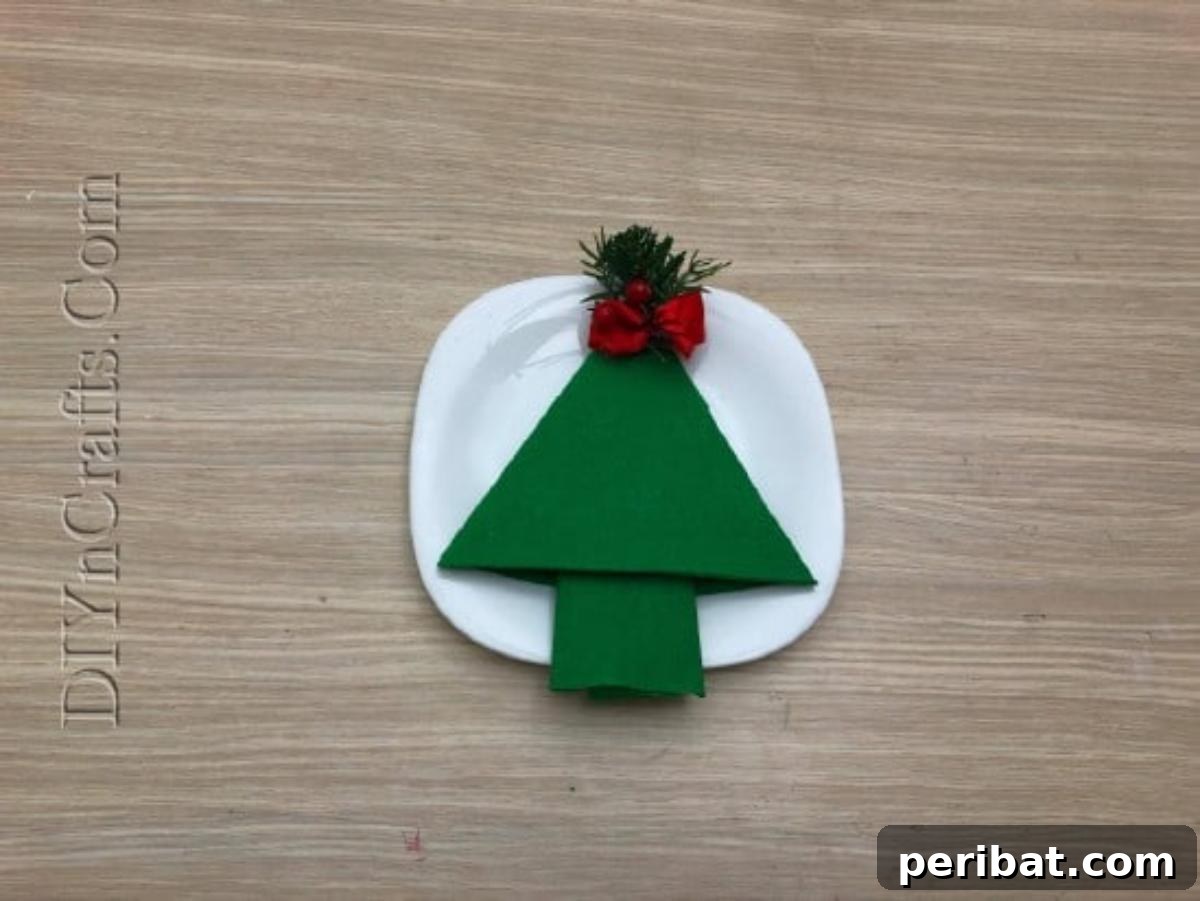 Festive Folds: 5 Simple Christmas Napkin Designs 10 Christmas Tree - How to Fold These 5 Easy and Decorative Christmas Napkins