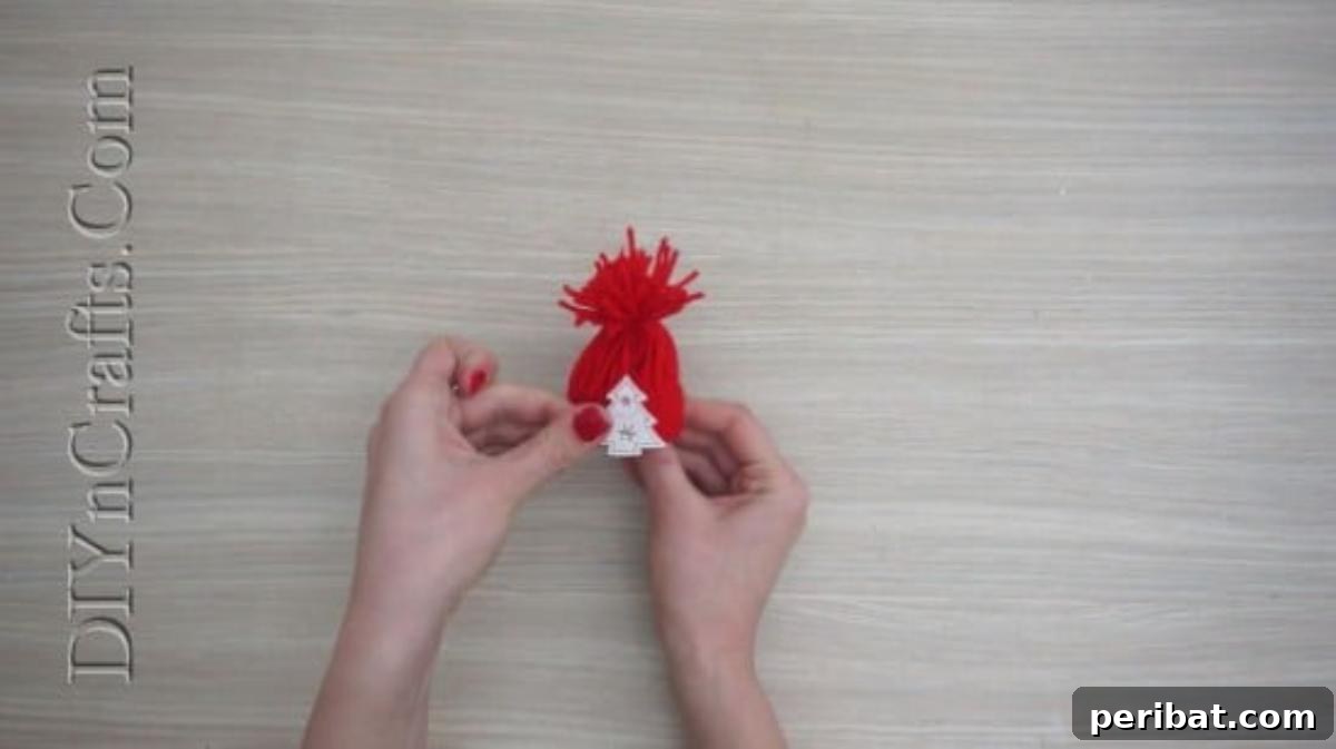 Hats - Adding embellishments to a finished miniature Christmas yarn hat