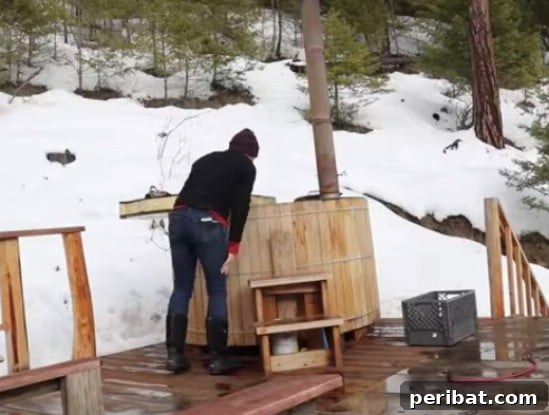 Homemade wood-fired cedar hot tub with a natural aesthetic