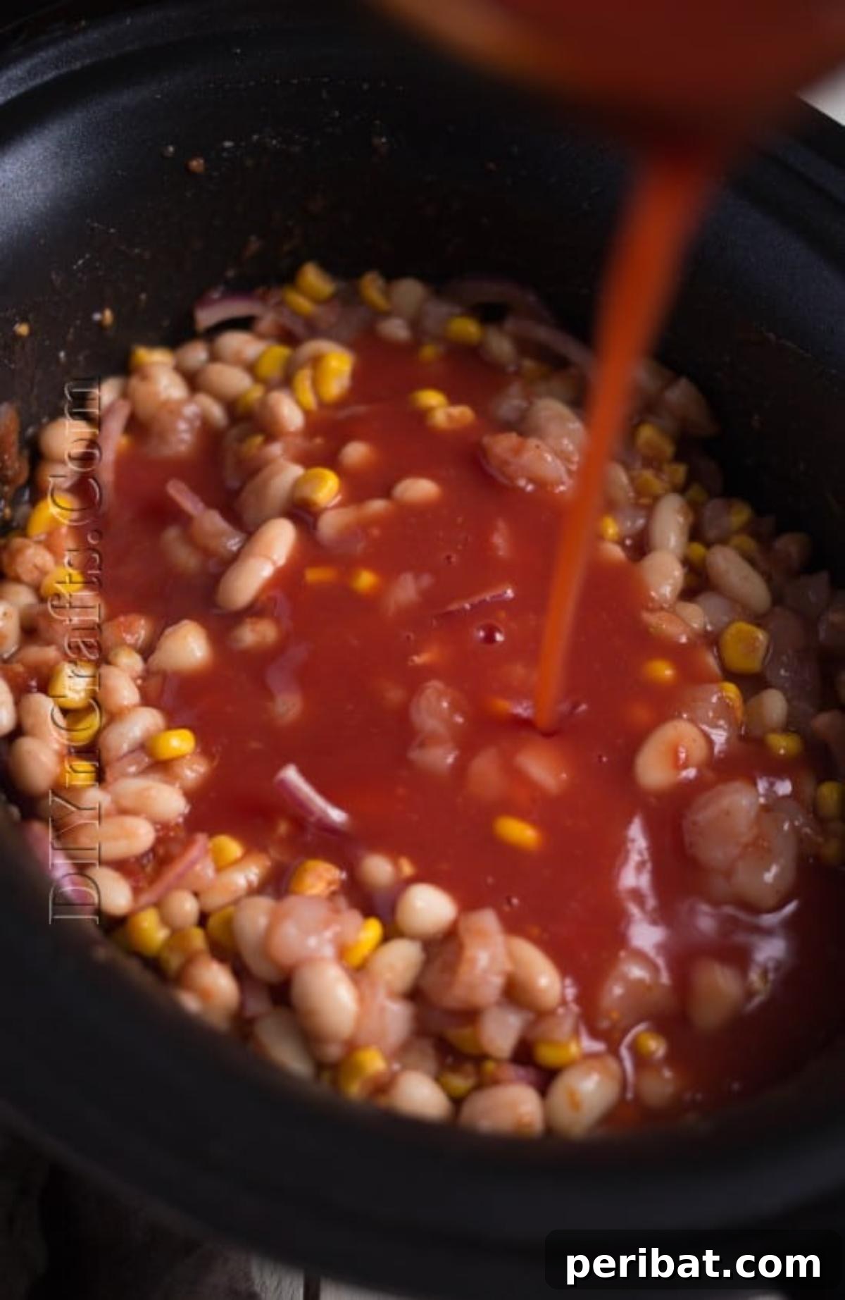 Sweet tortilla soup cooking inside the slow cooker