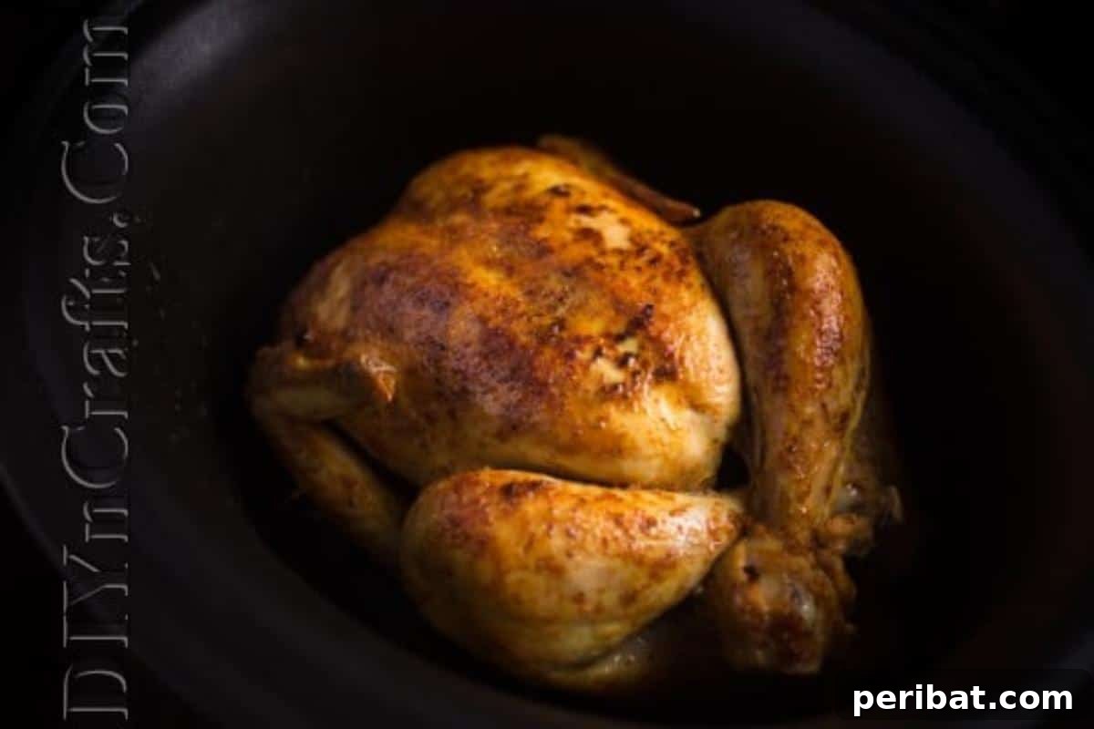 Chicken cooking inside the slow cooker