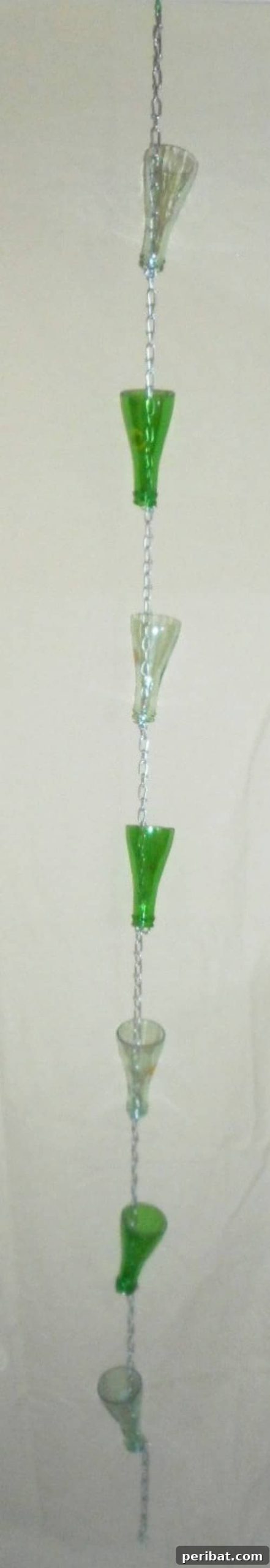 15 Brilliant DIY Rain Chains: Turn Downspouts into Delightful Water Features 4 Elegant Upcycled Glass Bottle Top Rain Chain