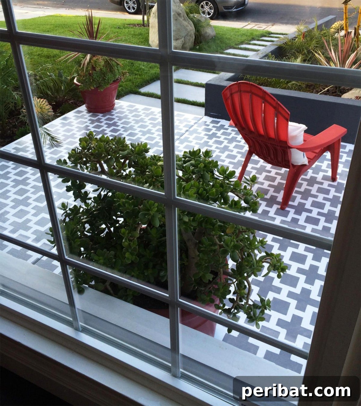 Smart DIY Solutions for Small Backyard Style 16 DIY Updated Patio Floor, using paint and patterns to visually enlarge a small outdoor patio.