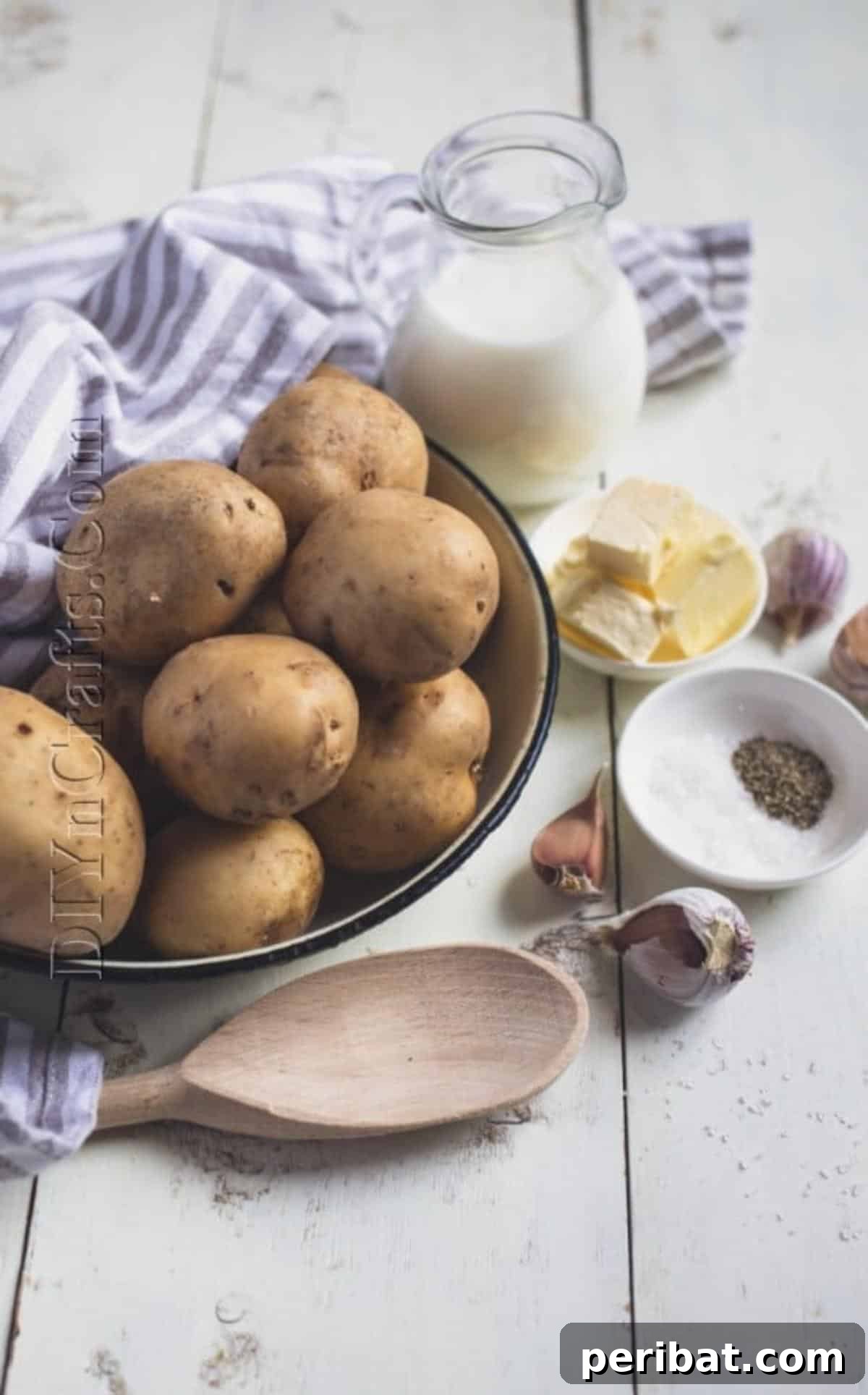 Ingredients for slow cooker mashed potatoes laid out on a counter