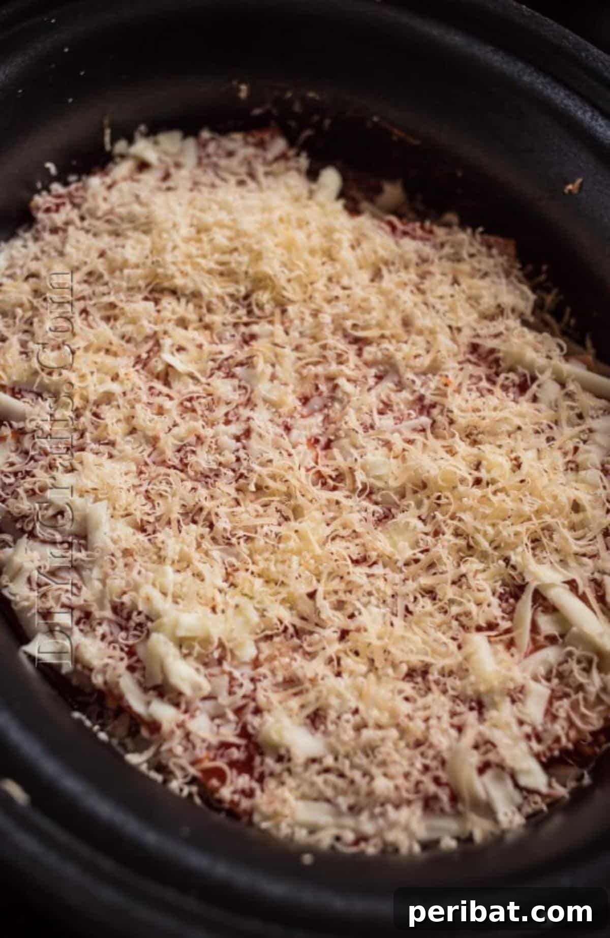 Slow Cooker Lasagna: Classic Flavor, Zero Fuss 5 Slow cooker with perfectly cooked lasagna, steam rising.