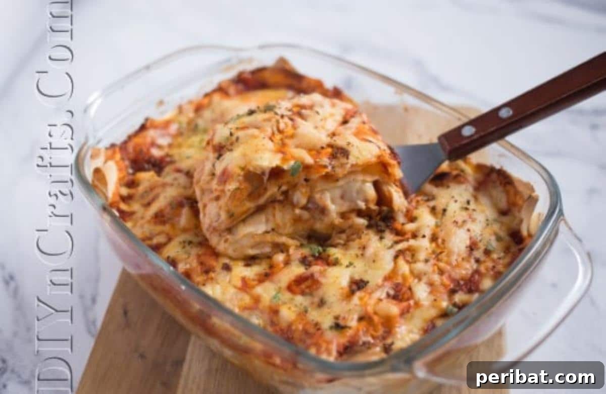 Serving a portion from the finished casserole.