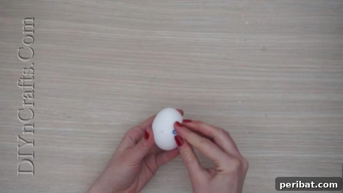 5 Brilliant & Easy Easter Egg Projects 21 Step 1 (continued): Close-up of an egg with googly eyes, conveying an immediate sense of wonder, shock, or playful astonishment.