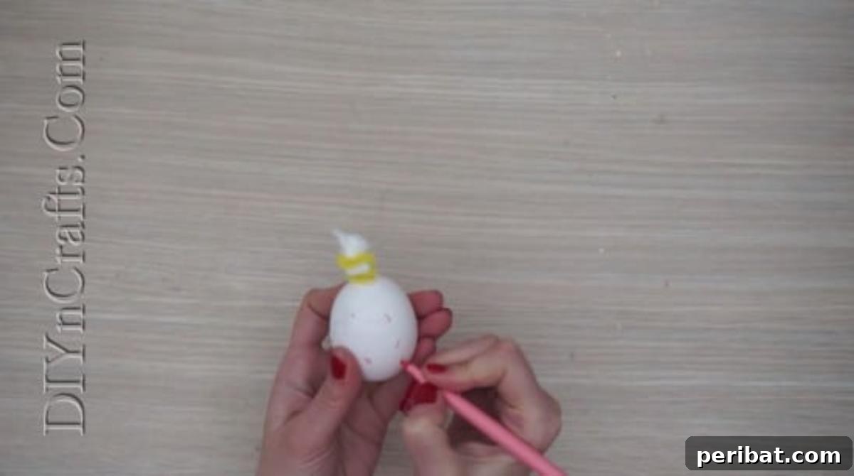 5 Brilliant & Easy Easter Egg Projects 4 Step 3: Drawing colorful sprinkles onto the egg with markers, transforming it into a vibrant and delicious-looking ice cream scoop.