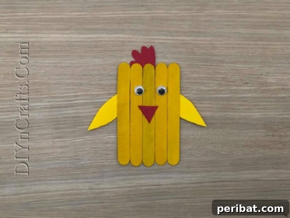 Craft Stick Easter Magic: 5 Simple DIY Projects 21 Completed second style of craft stick Easter chick with drawn eyes