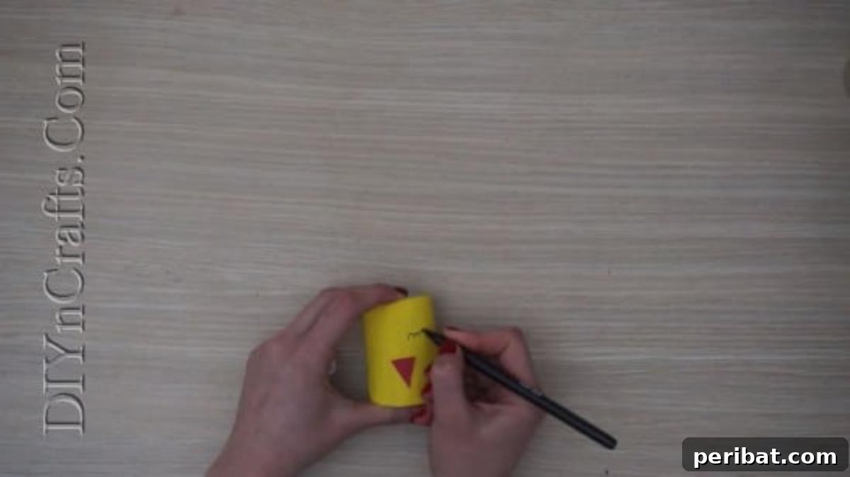 Instant Easter Fun: 5 Crafts for Kids in Under 5 Minutes 11 Drawing simple black eyes above the beak on the Easter chick basket.