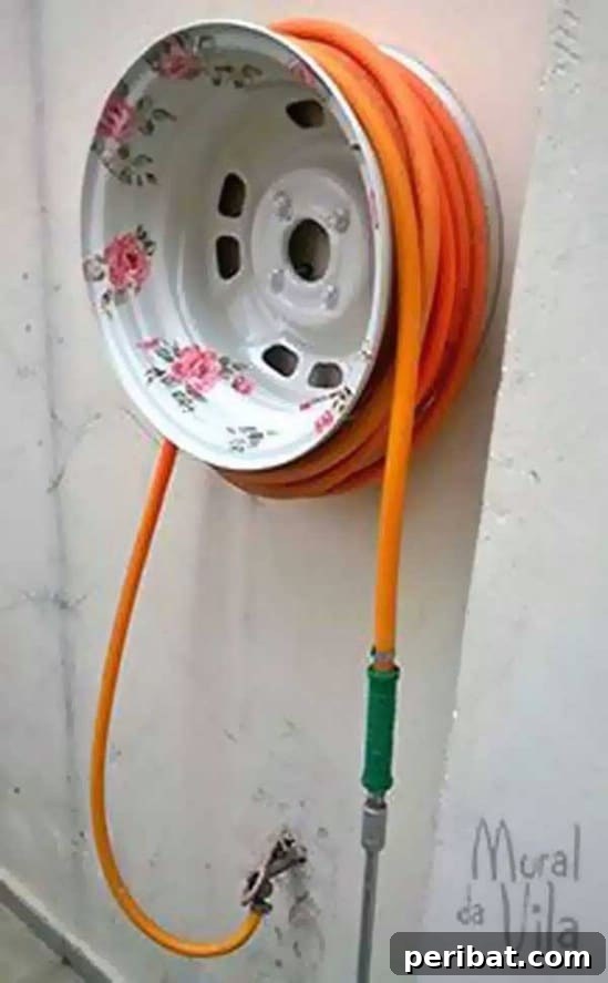 Clever DIY Hose Organizers to Neaten Your Outdoor Space 9 Upcycled Tire Rim Hose Holder
