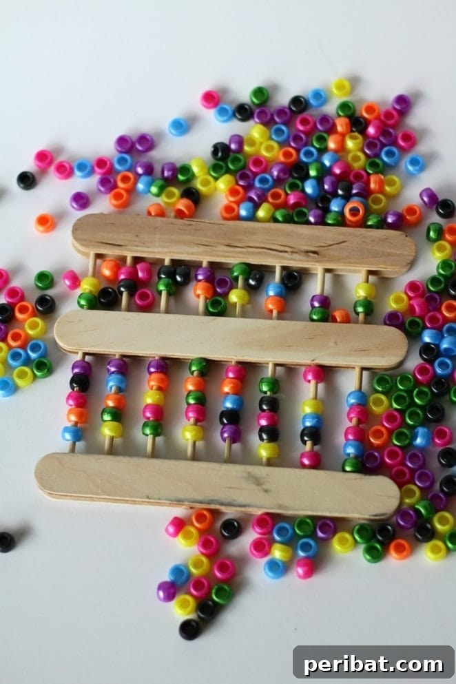 Crafting Summer Memories: Delightful Popsicle Stick Projects for Kids 22 DIY Popsicle Stick Abacus for counting practice