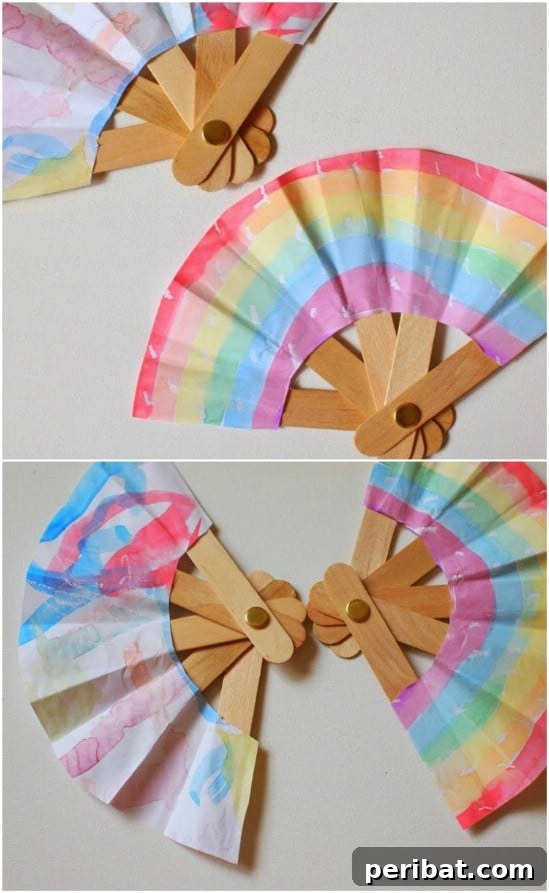 Crafting Summer Memories: Delightful Popsicle Stick Projects for Kids 25 DIY Folding Popsicle Stick Fan decorated with colorful patterns