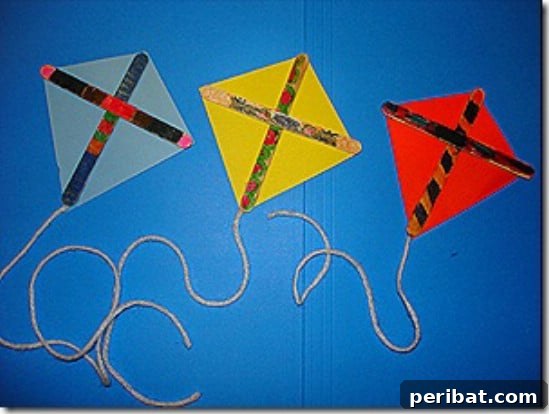 Crafting Summer Memories: Delightful Popsicle Stick Projects for Kids 29 Small Popsicle Stick Kites decorated with colorful paper