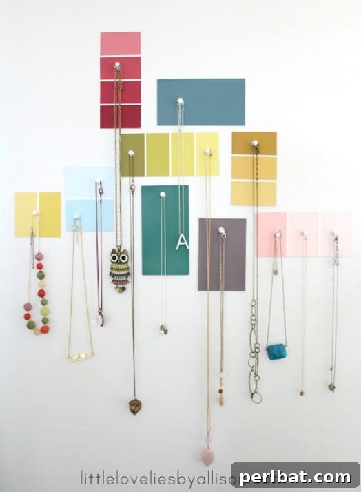 Repurposed Paint Chip Jewelry Display for Colorful Organization