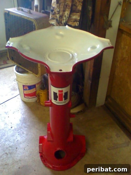 Rustic Charm: 10 Creative Farm Equipment Upcycles for Home & Garden Decor 12 Large bird bath made from a repurposed tractor front end, perfect for a farmhouse garden