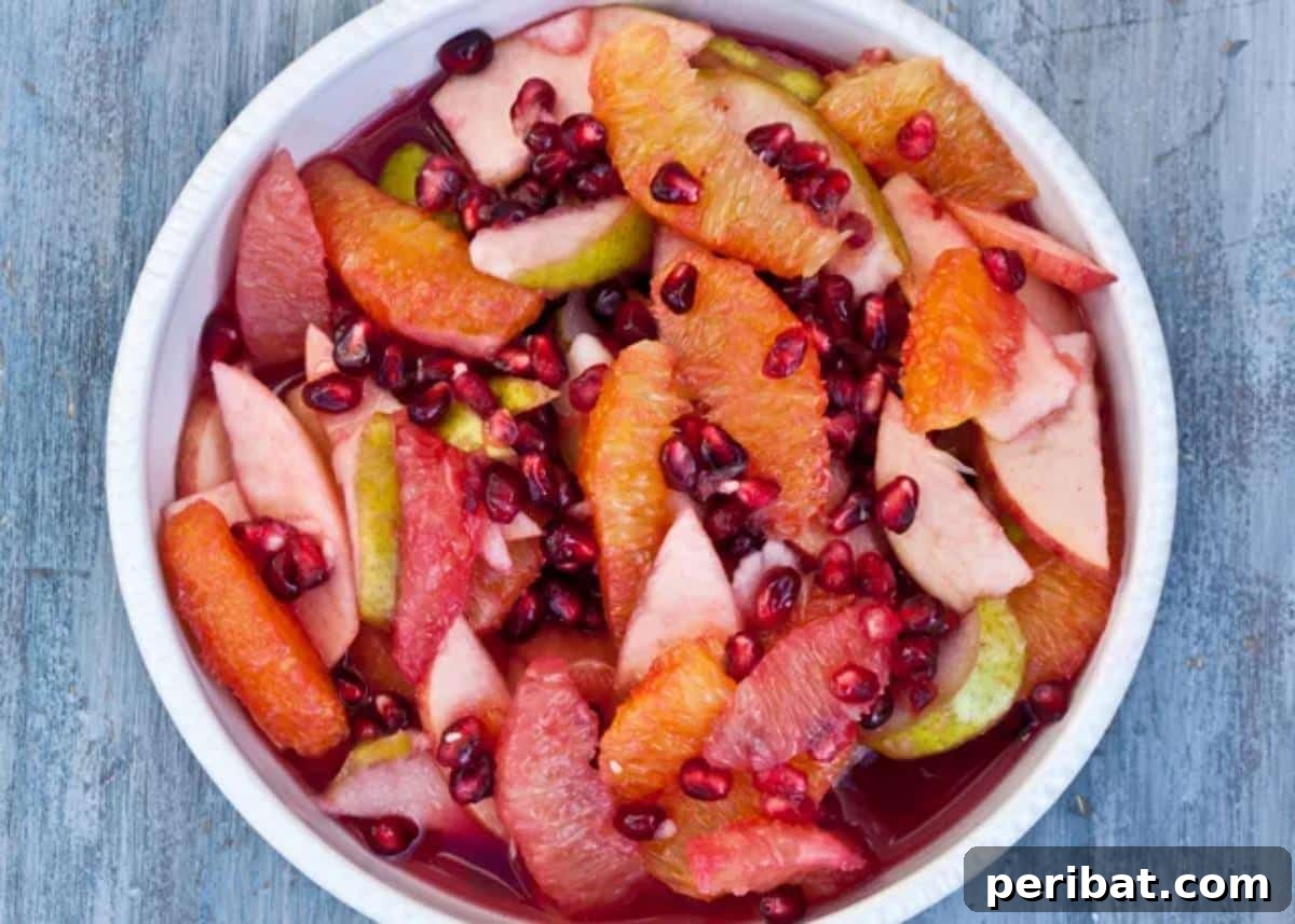 Vibrant Winter Fruit Salads: Delicious & Nutritious 7 A refreshing Apple, Pear, and Pomegranate Salad, perfect for a winter treat.