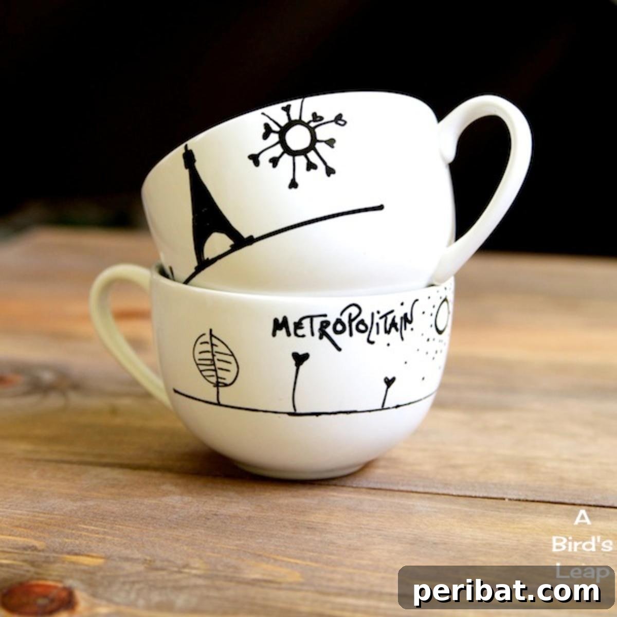A set of custom-painted white coffee mugs with unique, hand-drawn designs, showcasing personalized artistry.
