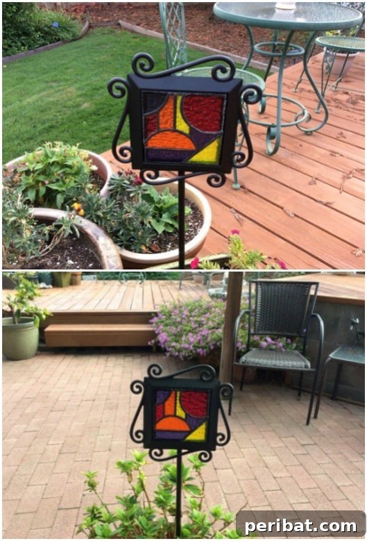 Colorful stained glass garden stakes marking plants