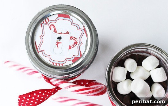 The Essential 50 Plus Creative Christmas Printables Pack 30 Snowman Soup printable with label and recipe, perfect for gifting hot chocolate mixes.
