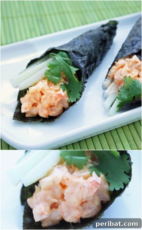 Fresh spicy shrimp hand rolls wrapped in nori seaweed